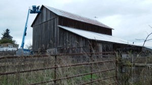 Securing barn roof panels